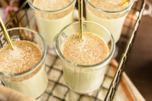 Traditional holiday drink egg nog garnished with nutmeg.